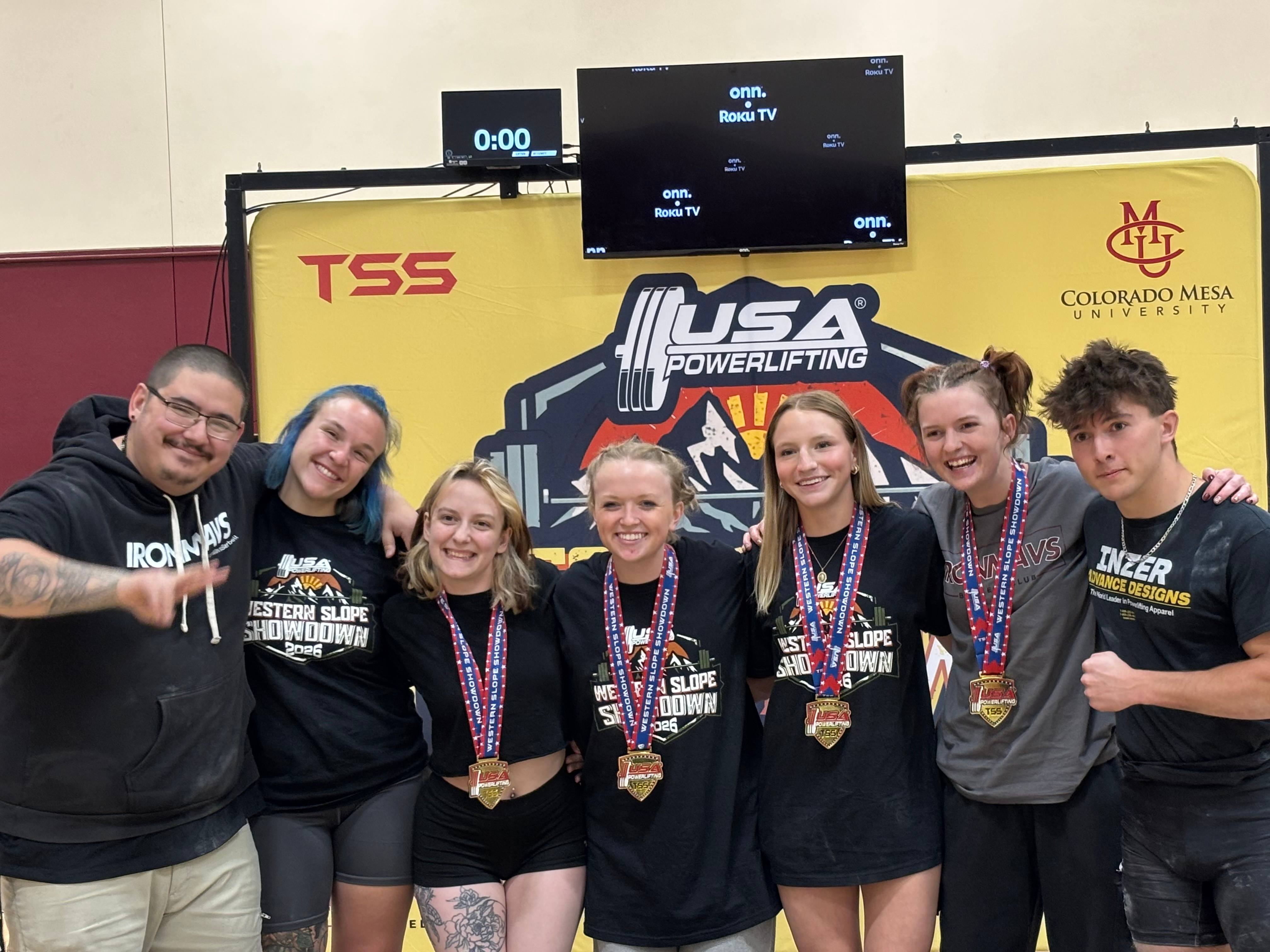 Iron Mavericks lifters with their medals at the Western Slope Showdown