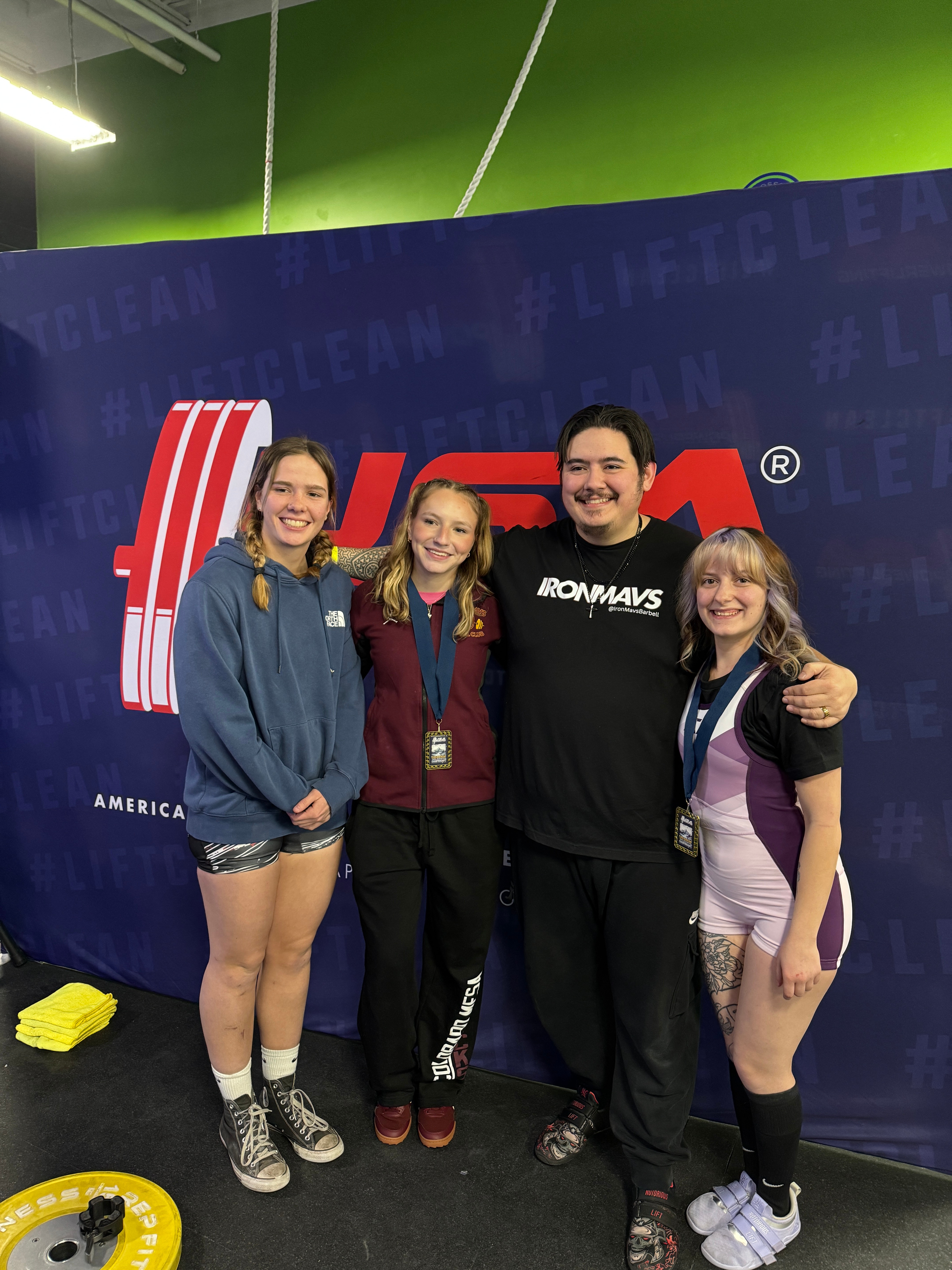Iron Mavericks athletes at a USA Powerlifting competition